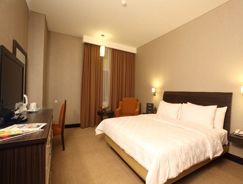Swiss-Belhotel Kendari Quarto foto